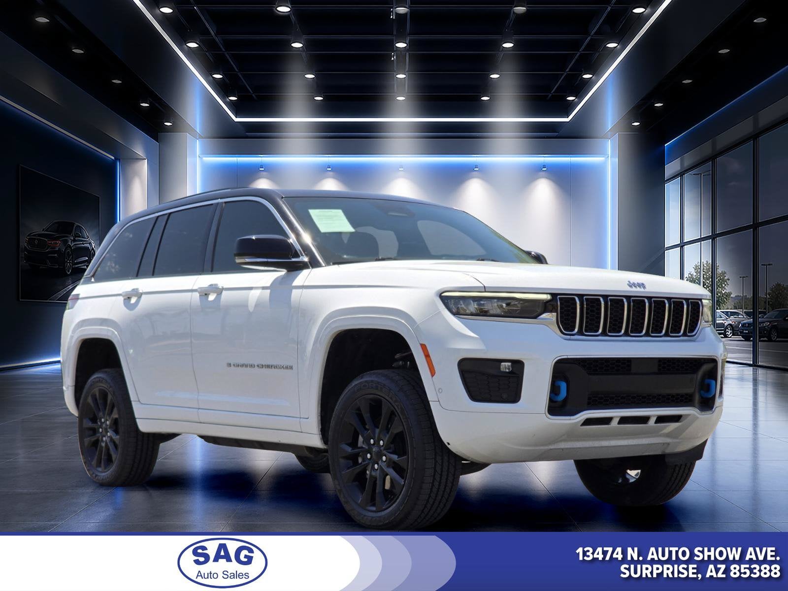 2023 Jeep Grand Cherokee 4xe Overland in Bright White Clearcoat — front three-quarter view