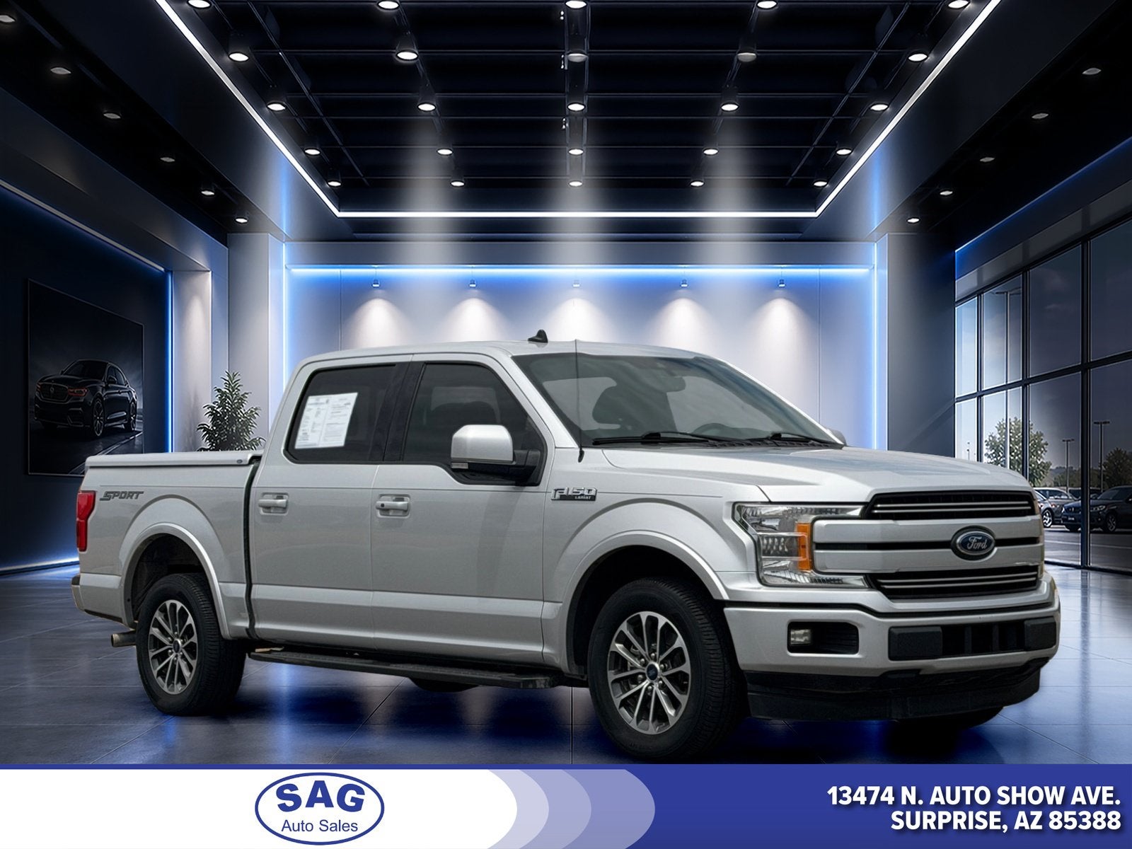 2019 Ford F-150 LARIAT in Ingot Silver — front three-quarter view