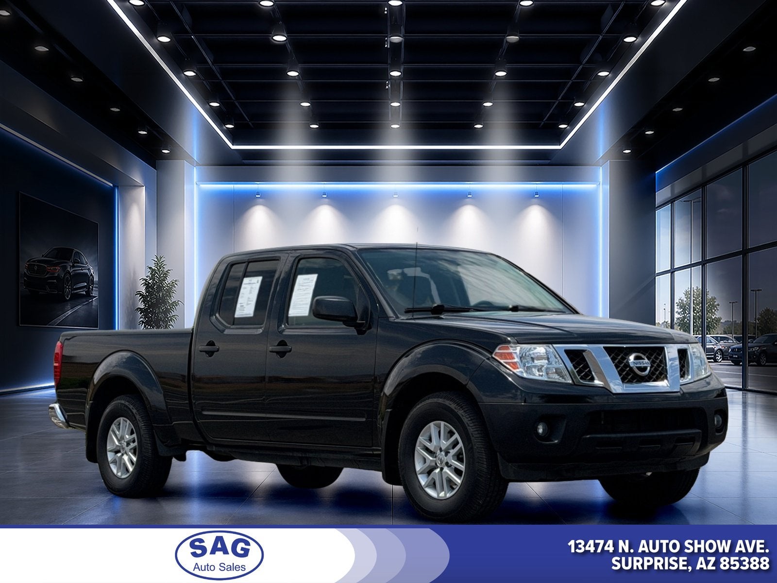 2021 Nissan Frontier SV in Magnetic Black Pearl — front three-quarter view