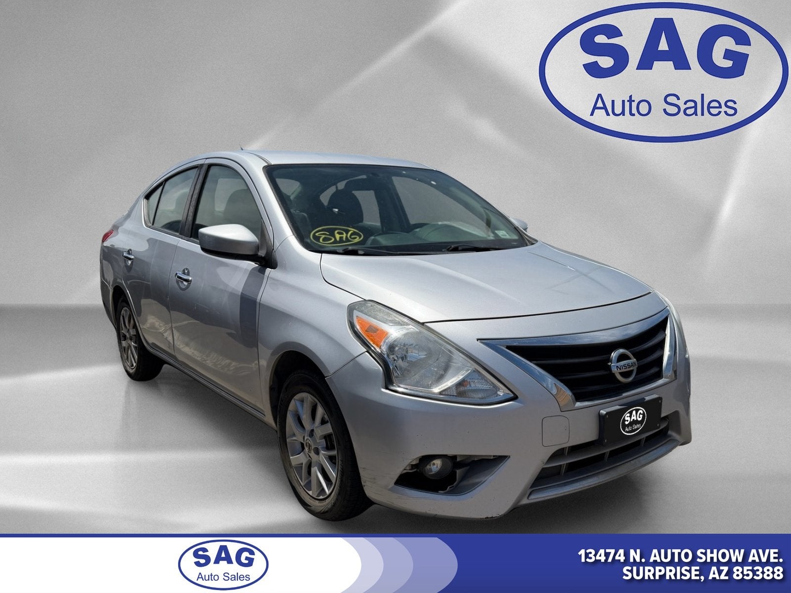 2018 Nissan Versa Sedan SV in Brilliant Silver — front three-quarter view