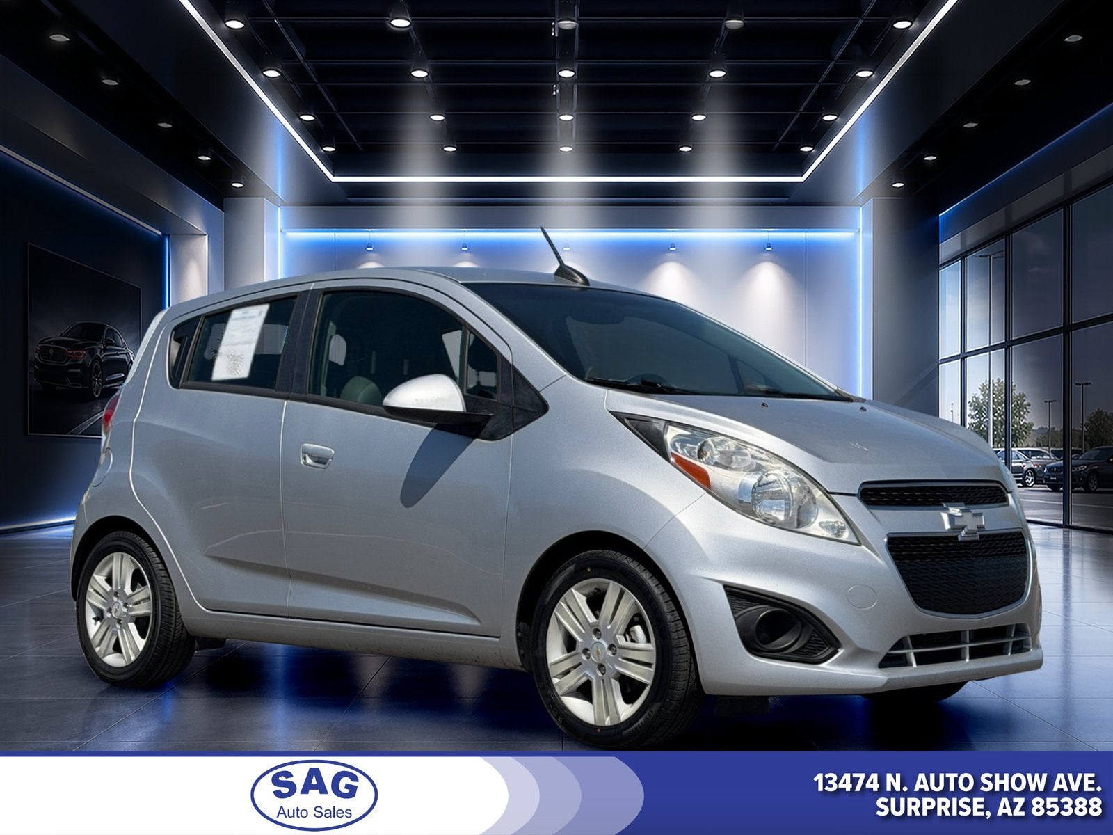2015 Chevrolet Spark LT in Silver Ice — front three-quarter view