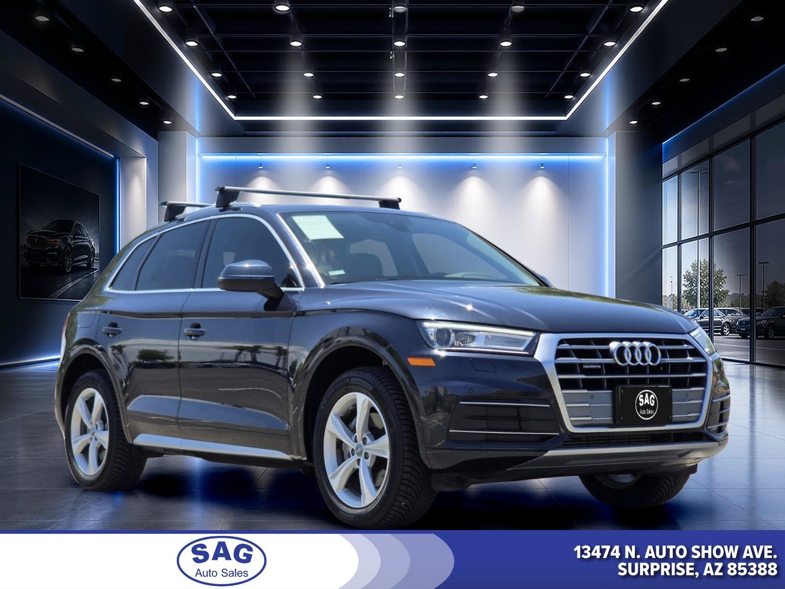 2020 Audi Q5 Premium in Moonlight Blue — front three-quarter view